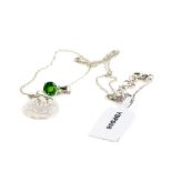 A silver Gems TV pendant and chain, with an emerald stone for the month of May, on fine link