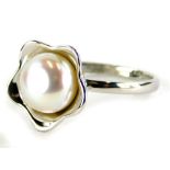 A silver dress ring, with central cluster design set with cultured pearl, ring size L½, 3.9g all