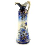 Withdrawn pre-sale by Vendor A German or Austrian porcelain ewer, decorated with flowers, leaves.