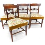 A set of four early 19thC mahogany dining chairs, each with a shaped back, a carved crest and a