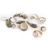 A group of moonstone jewellery, to include a pendant in silver frame, four silver dress rings, two