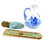A Stratton retractable comb in enamel type case, a Royal Doulton miniature blue printed vase and a