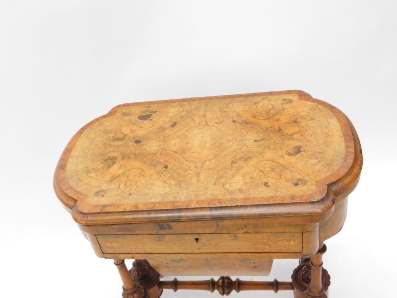 A Victorian walnut games/work table, the quarter veneered top with a burr yew crossbanded border and - Image 3 of 4