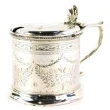 A Victorian silver cylindrical mustard pot, with blue glass liner, London 1874, weighable silver