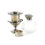 A George V two handled silver campana shaped urn, with a gadrooned border and a square base,