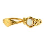 Two dress rings, to include a 9ct gold opal set dress ring, with weave design shoulders, ring size