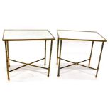 A pair of brass rectangular occasional tables, each with a mirrored top etched with Chinoiserie