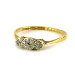 A Victorian 18ct gold and platinum dress ring, with design of three platinum circles, each