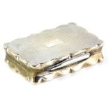 A George V silver rectangular snuff box, the hinged lid engraved with engine turned decoration and a