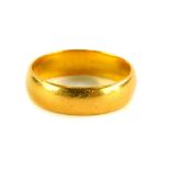 A 22ct gold wedding band, of plain design, ring size K, 4.8g.