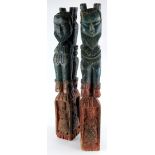 A pair of Indian carvings, each modelled with bearded figures, etc., in the European style,