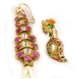 Two Indian single earrings, to include a silver gilt, set with white sapphire and later