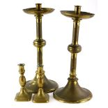 A pair of gilt brass church candlesticks, 37cm high, and a pair of 19thC brass candlesticks, 15cm