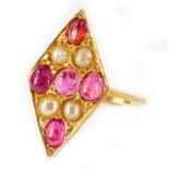 A marquise shaped ruby and pearl dress ring, the marquise design set with five rubies and four