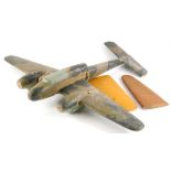 A painted beech model of a two engined military aircraft, (AF), 81cm wide, and two extra wing