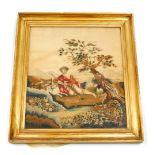 A mid 19thC silk picture, embroidered with a Scottish figure with Sheepdog and sheep beside a tree