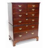 A late 18th/ early 19thC tall oak chest of drawers, the top with a moulded edge above four short and