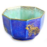 A Wedgwood Dragon lustre octagonal bowl, decorated centrally with a dragon on opalescent ground, the