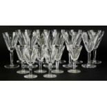 A part set of Waterford Sheila pattern glasses, comprising ten small wine glasses and six brandy