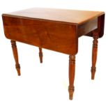 A Victorian mahogany Pembroke table, the top with rounded corners above a side drawer on turned