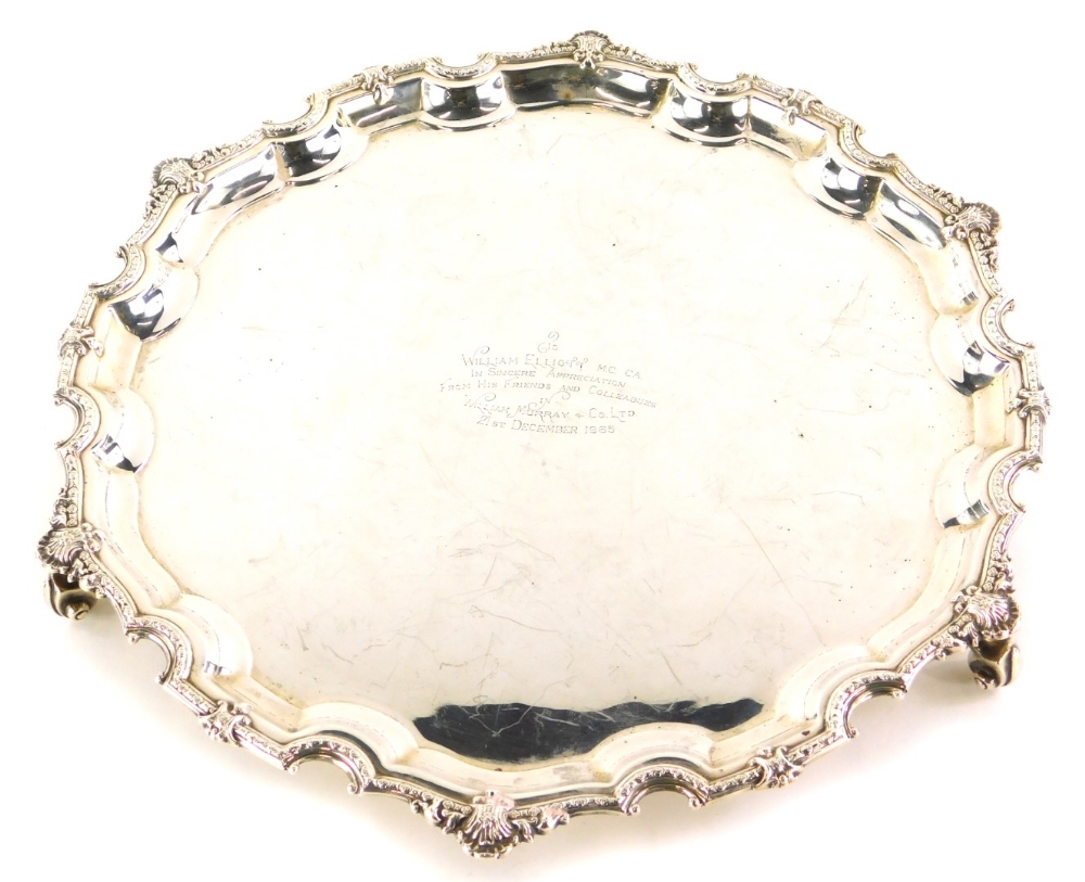 An Elizabeth II silver salver, the shaped piecrust border cast with shells, etc., engraved to the