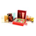 A collection of perfumes, to include a small bottle of Chanel No 5, Estee Lauder, Calvin Klein,