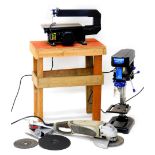 An Ennerger 85 watt scroll saw, an Ennerger 350 watt drill press, and an angle grinder.