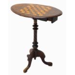 A Victorian walnut games table, the oval drop leaf top inlaid with a chess board, on turned column