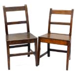 Two similar late 18th/early 19thC oak side chairs, each with a plain back, solid seat and square