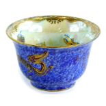 A Wedgwood Dragon lustre small bowl, decorated with dragons internally, on opalescent ground, the