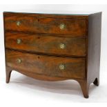 An early 19thC mahogany bow fronted chest of drawers, the caddy top with a crossbanded boxwood