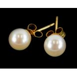 A pair of 9ct gold and cultured pearl stud earrings, each with butterfly backs.