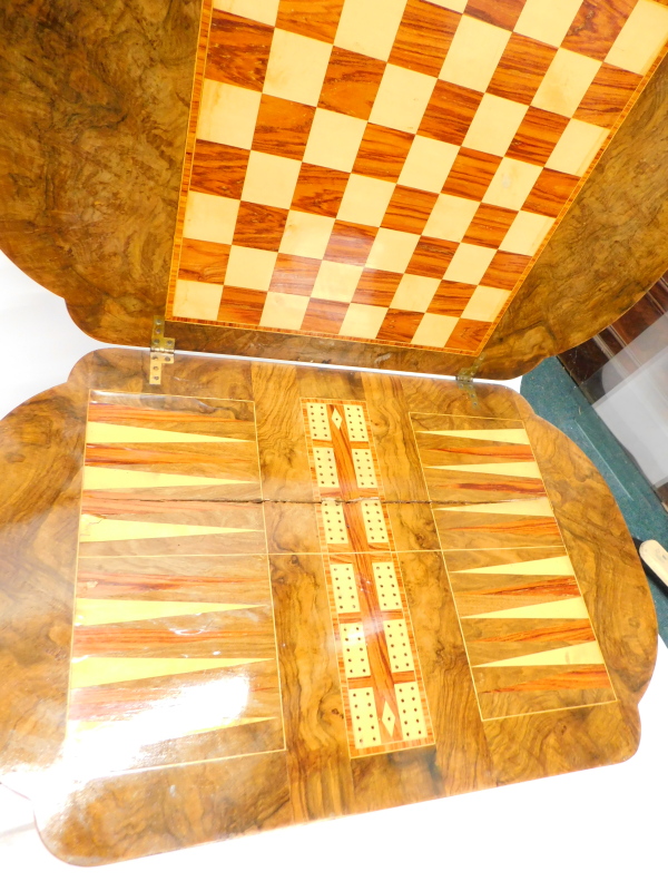 A Victorian walnut games/work table, the quarter veneered top with a burr yew crossbanded border and - Image 4 of 4