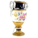 A late 19th/early 20thC German porcelain vase, pained with flowers within gilt and cobalt blue