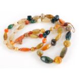 A hardstone necklace, set with various coloured agate and jade beads, of varying sizes and shaped,