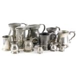 A quantity of 19thC and later pewter, to include measures, tankards, etc.