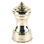 A George VI silver pepper grinder, London 1939, 3¾ all in, 8cm high.
