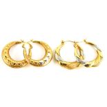 Two pairs of 9ct gold bi-colour hoops, one pair set with three silvered hearts and other heart