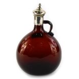 A Victorian brown tinted mallet shaped spirit decanter, with silver plated mount, unmarked, 21cm