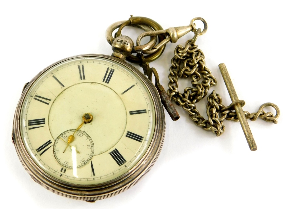 A silver pair cased pocket watch, the white enamel dial, with Roman numerals and seconds dial,