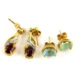 Two pairs of 9ct gold stone set earrings, to include a pair of aquamarine studs, and a pair of 9ct
