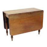An early 19thC mahogany drop leaf table, with rounded corners on turned tapering legs, 73cm high,