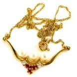 A 9ct gold pendant and chain, the articulated pendant set with three cultured pearls and design of