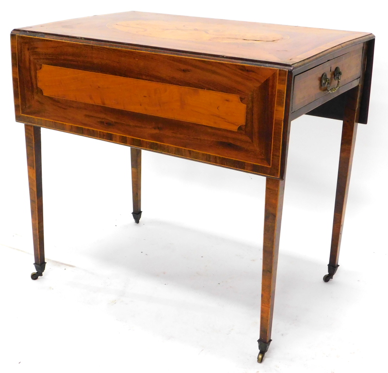 An early 19thC mahogany and satinwood and crossbanded Pembroke table, the rectangular top inlaid