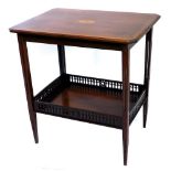 An Edwardian mahogany two tier table, the rectangular canted top with a central marquetry fan, on