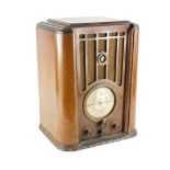 An Art Deco Pilot model U/650 radio, in a walnut and ebonised case, 47cm high, 36cm wide.