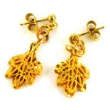 A pair of Eastern design earrings, with pleated leaf design, on gold plated backs, with butterfly