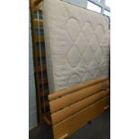 A modern wooden double bed, with Beauty Sleep Rome mattress.