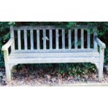 A slatted hardwood garden bench, 151cm wide.