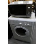 An Indesit washing machine, and a Sharp microwave.